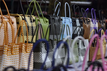 Colorful handmade purun woven bags from natural grass for eco lifestyle and sustainable fashion