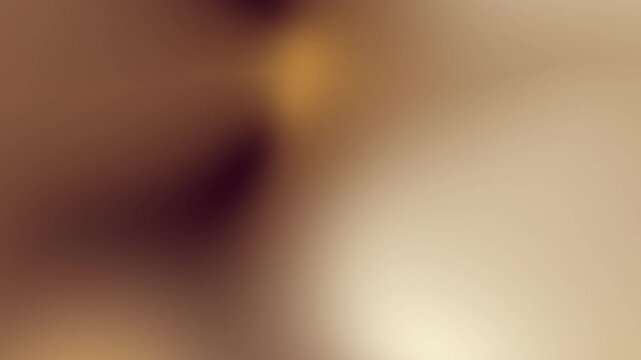 Blurred abstract gradient in brown and tan tones. Suitable for backgrounds, overlays, and artistic design projects.