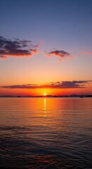 Fototapeta premium Golden hour reflections shimmering across still waters at dusk creating a serene spectacle