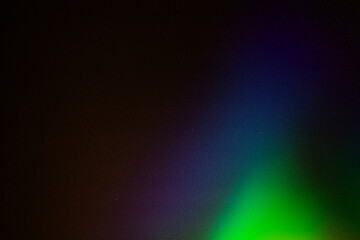light leak overlay effect with green light leaks,retro grain noisy film distressed texture light leak flare on black background,old film burn background,abstract background with colorful rays