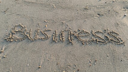 Business written in sand offers an optimistic message of new beginnings and opportunity in the digital landscape