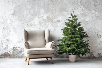 Neutral armchair sits beside a decorated evergreen tree against a textured wall.