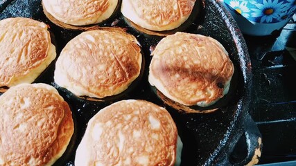 Close up shot of making Kamir. Kamir basically is a bread that almost similar to pancake from Pemalang, Central Java, Indonesia. 