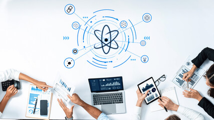 Dynamic collaborative workspace showcasing modern technology and scientific themes, featuring data analysis tools and team interaction for innovative solutions. Trope