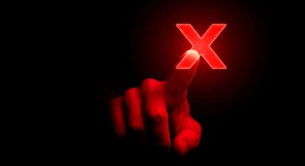 Finger presses a large red x button in the dark, symbolizing rejection or error with a sense of urgency and importance.