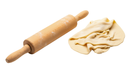 A simple wooden rolling pin and dough rests on a white background