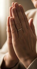 Hands in Prayer - A Moment of Reflection and Faith.