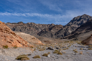 Obraz premium Furnace Creek Assemblage / Formation,（Tft）Travertine. with Alluvial deposits. Travertine Point, Death Valley National Park, Inyo County. California State Route 190. Funeral Mountains.