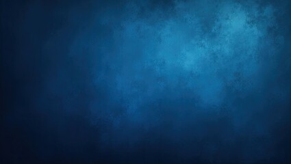 Fototapeta premium Dark blue textured background shows a gradient of tones, transitioning from deep shadows to brighter, diffused light.