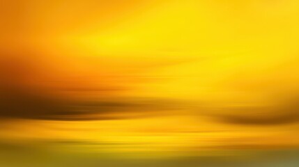 Obraz premium An abstract, blurred landscape of vibrant yellow and orange hues with horizontal streaks, evoking warmth, light, and motion. A serene yet dynamic golden background, blurred yellow background