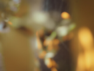 Golden brown blur image for New Year or Christmas abstract background.   
