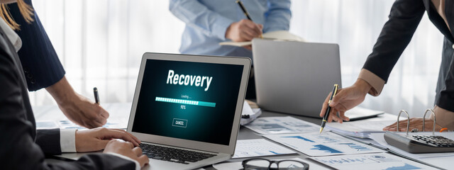 Business intelligence and data analysis concept. Analyst team working on financial data analysis...