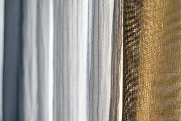 Close-Up Of Textured Gold And white Curtain Fabric