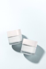 Cosmetic containers placed in spaces with natural light

