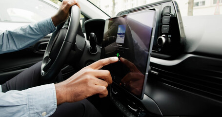 Black Man Using Touchscreen Infotainment Panel