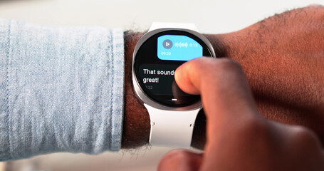 African American Man On Smartwatch Sending Chat Messages Online