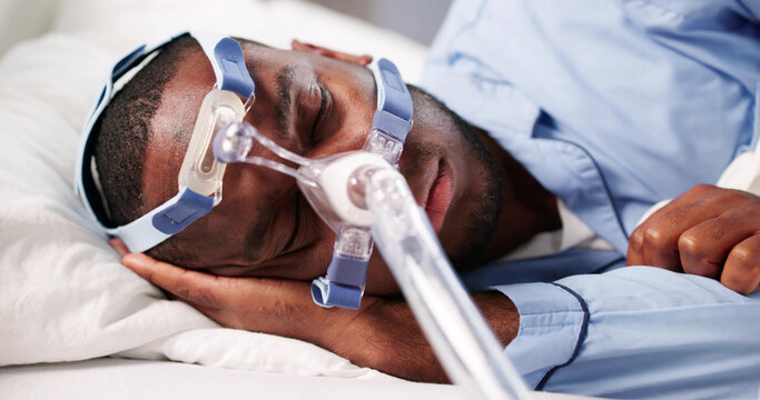 African American Man Using CPAP Mask