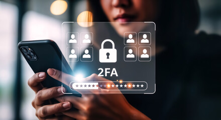 Woman holding a smartphone displaying a holographic security interface with a padlock icon and 2fa text, indicating twofactor authentication and secure login for digital accounts