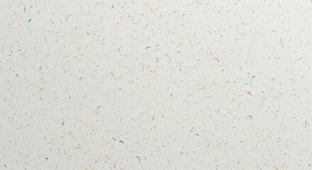 Naklejka premium Close-up view of a speckled white surface, showcasing a textured background with tiny colorful flecks.