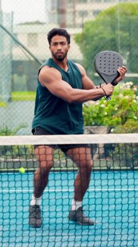 Competition, fitness and padel with man on court for game, practice or winning point. Exercise, racket and tennis with athlete or player outdoor for celebration, match performance or sports scoring