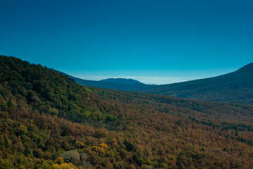 Picturesque valley with hills in autumn