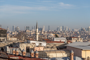 Istanbul Skyline Mosque rooftops cityscape: Panoramic view showcasing historical and modern Istanbul architecture.