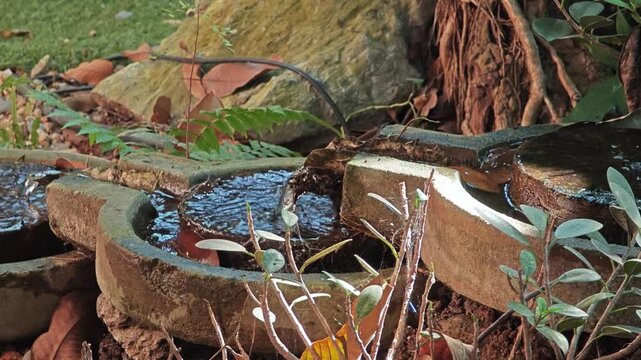 Fountain from old millstone or grindstone.