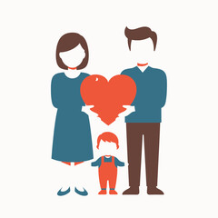 Family holding a heart symbolizing love and togetherness in a happy moment.