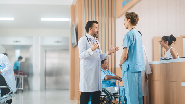 Eeuropean man doctor talking with medical student at hospital