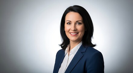 Businesswoman Headshot Smiling Professional Woman Portrait Corporate Profile Picture Executive Elegant Attire Against Gray Background