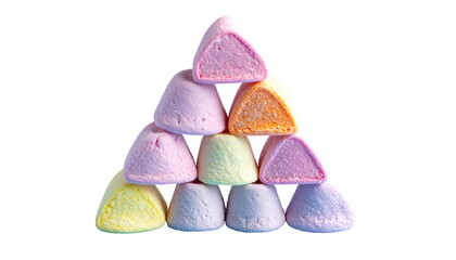 Stack of multi-colored, rounded-triangle marshmallows form a pyramid against a black background