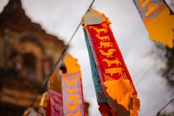 Religious offerings ribbons on a Buddhist temple in Chiang Rai, Thailand