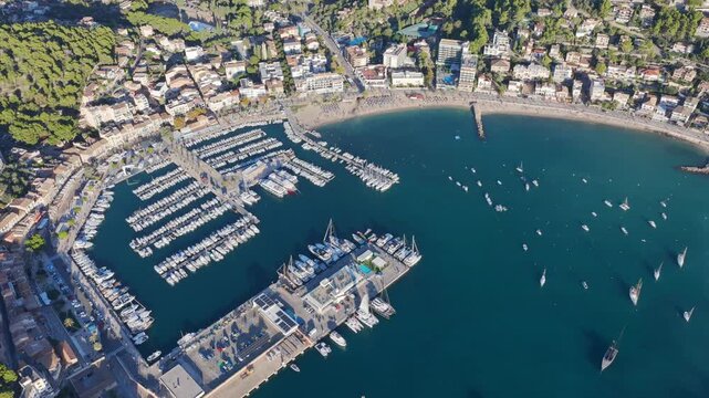 Golden Hour Aerial Panorama of Port Soller Harbor and Tramuntana Mountains in Mallorca, Spain
