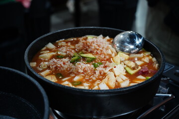 Hearty Korean Soybean Paste Stew with Rice, Tofu, and Vegetables