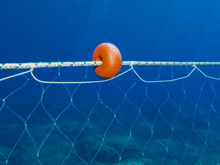 Fishing nets underwater in the Aegean Sea