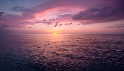 Obraz premium Pink Sunset Over Calm Ocean 2
