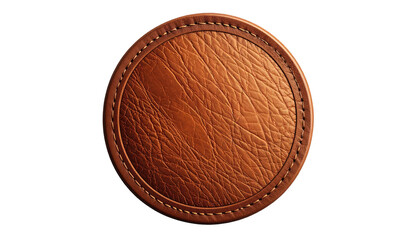 Round brown leather coaster, textured surface and stitched perimeter isolated against black, with soft lighting