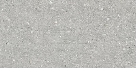 Gray concrete texture with stones for ceramic tile design. Cement background for a porcelain tile carpet.
