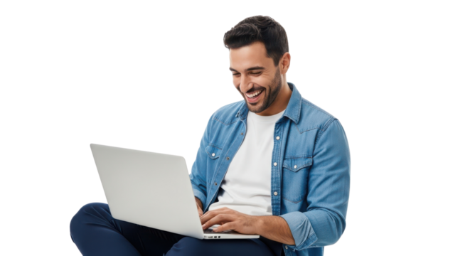 Happy young man typing on laptop computer while sitting casually and smiling isolated PNG with Transparent Background