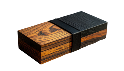 Box crafted of dark and light wood with varied grain patterns, tied with a black band. Elegant, simple form