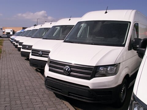 Volkswagen Crafter vans parked in dealership presenting fleet