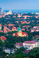 Naklejka premium Urban Environment of Jiangsu Road Christian Church, Qingdao, China