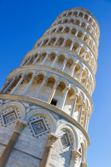 Leaning Tower of Pisa under clear blue sky, Italy