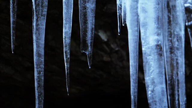 Winter forest cave, icicles that look cold as ice