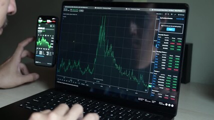 Business man trader investor analyst using laptop analytics for cryptocurrency financial stock market analysis analyze graph trading data index investment growth chart on screen. - Powered by Adobe