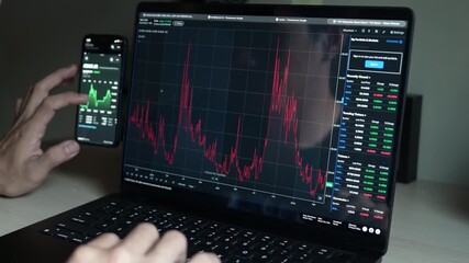 Business man trader investor analyst using laptop analytics for cryptocurrency financial stock market analysis analyze graph trading data index investment growth chart on screen. - Powered by Adobe