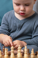 Preschooler discovering logic and strategy in play.