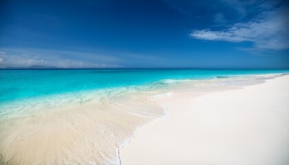 White Sand Gently Sloping Into A Vibrant Turquoise Sea