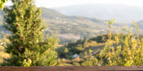 Empty Wooden Table Top with Blurred Nature Background