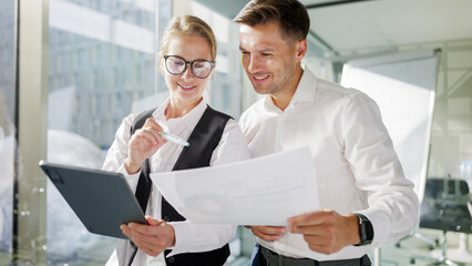 Colleagues collaborating in a modern office
